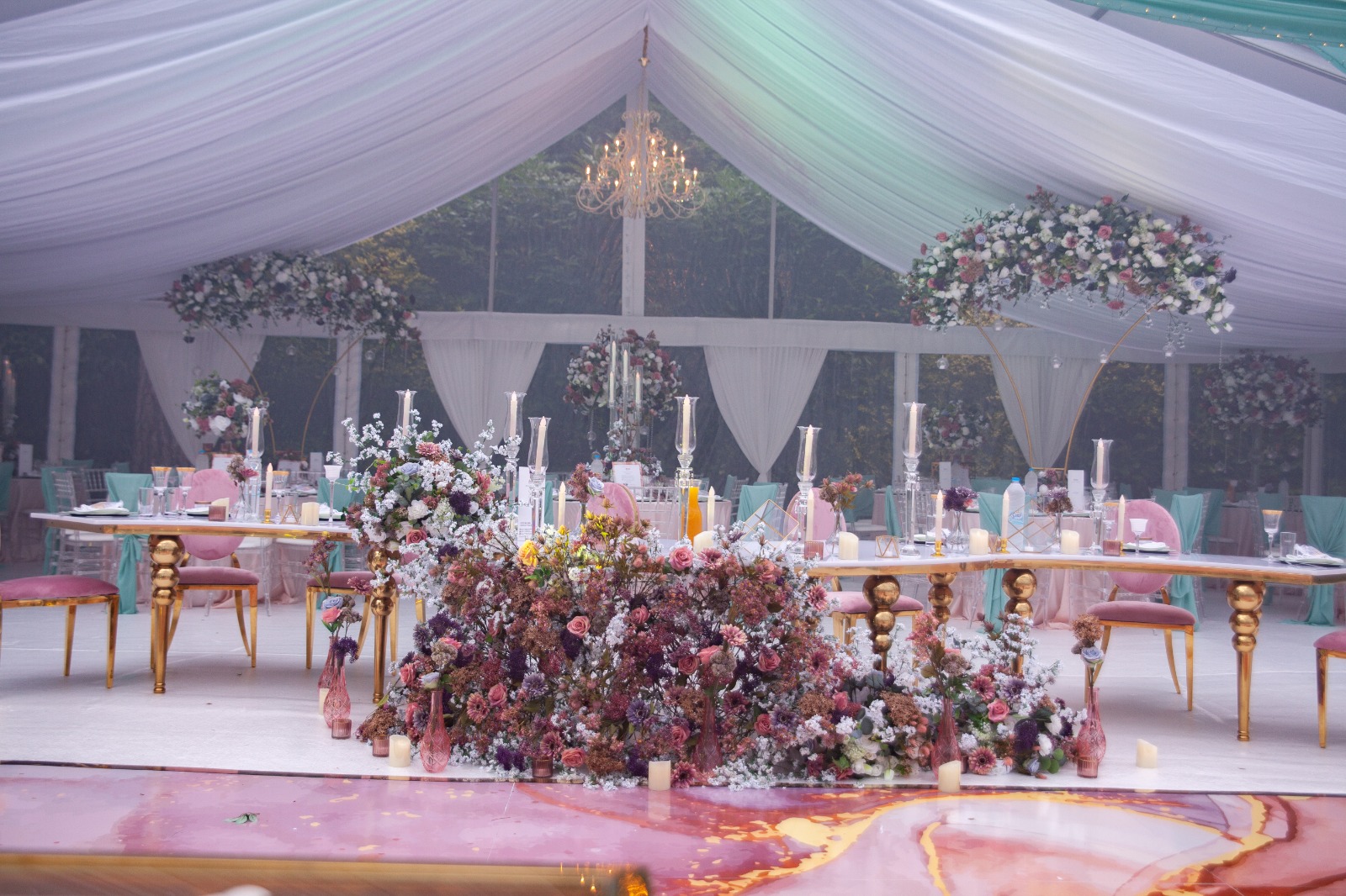 Elegant banquet setup in Prestige Suite with floral centerpieces for upscale weddings.