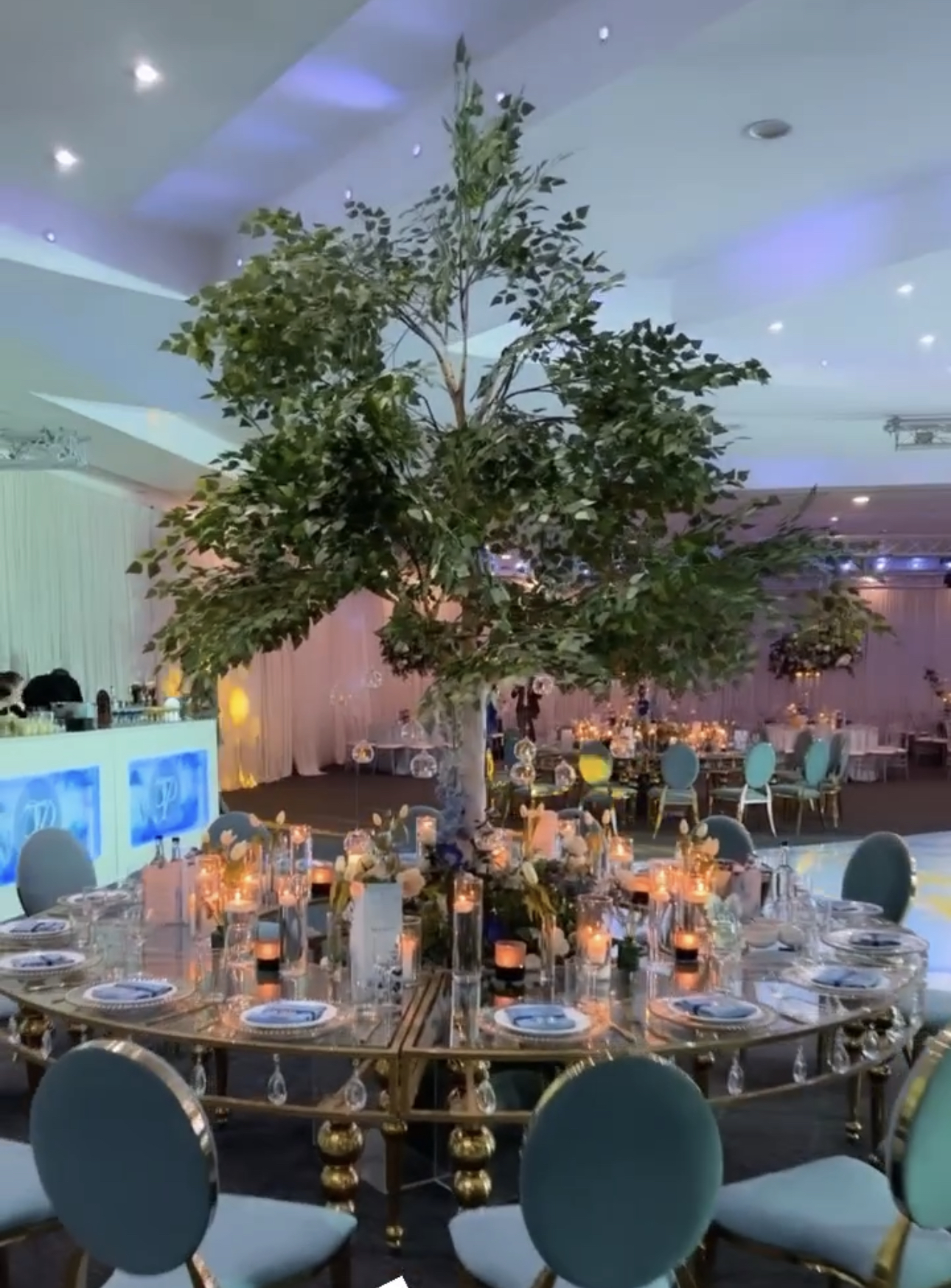 Elegant banquet setup in Prestige Suite with floral centerpieces for upscale events.