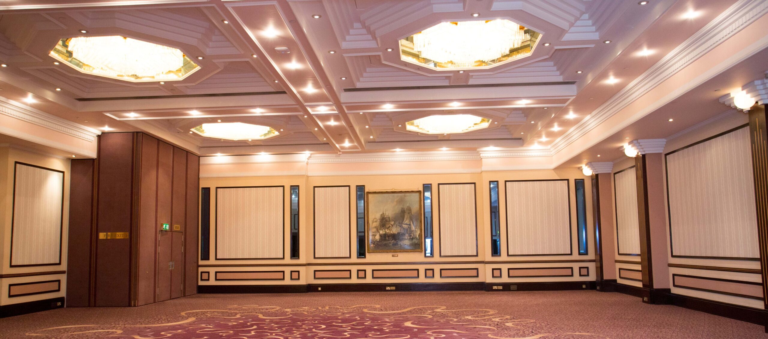 Elegant Prestige Suite with high ceilings, ideal for corporate meetings and social events.