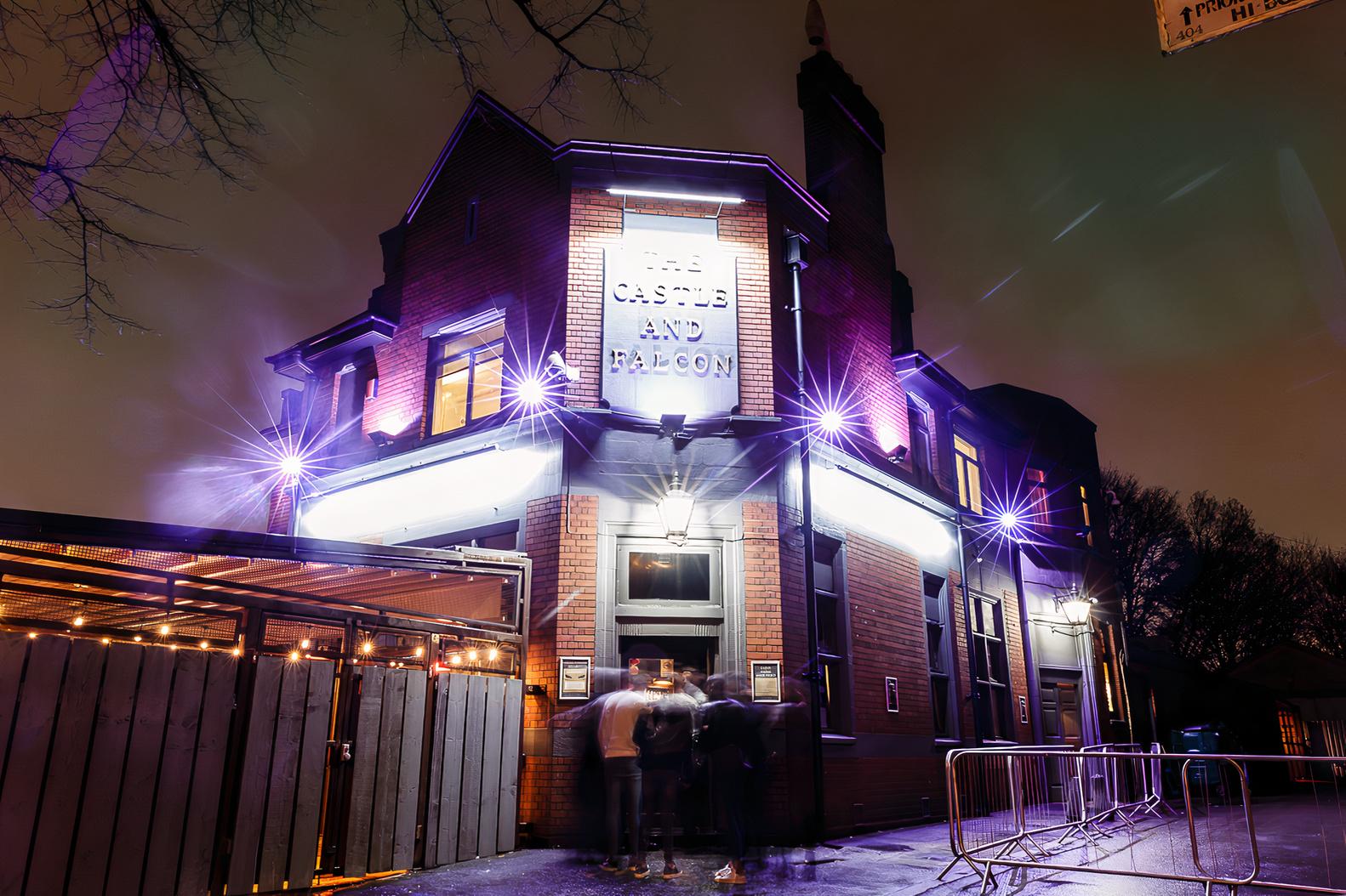 Vibrant Castle & Falcon bar with dynamic lighting, perfect for events and celebrations.