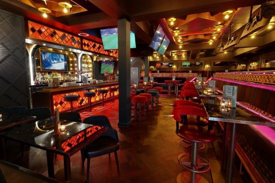 Vibrant Lounge Bar in Iron House, ideal for events and social gatherings.