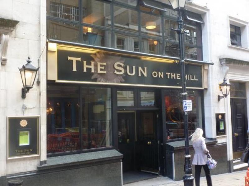 Bar entrance at The Sun on the Hill, ideal for casual meetings and networking events.