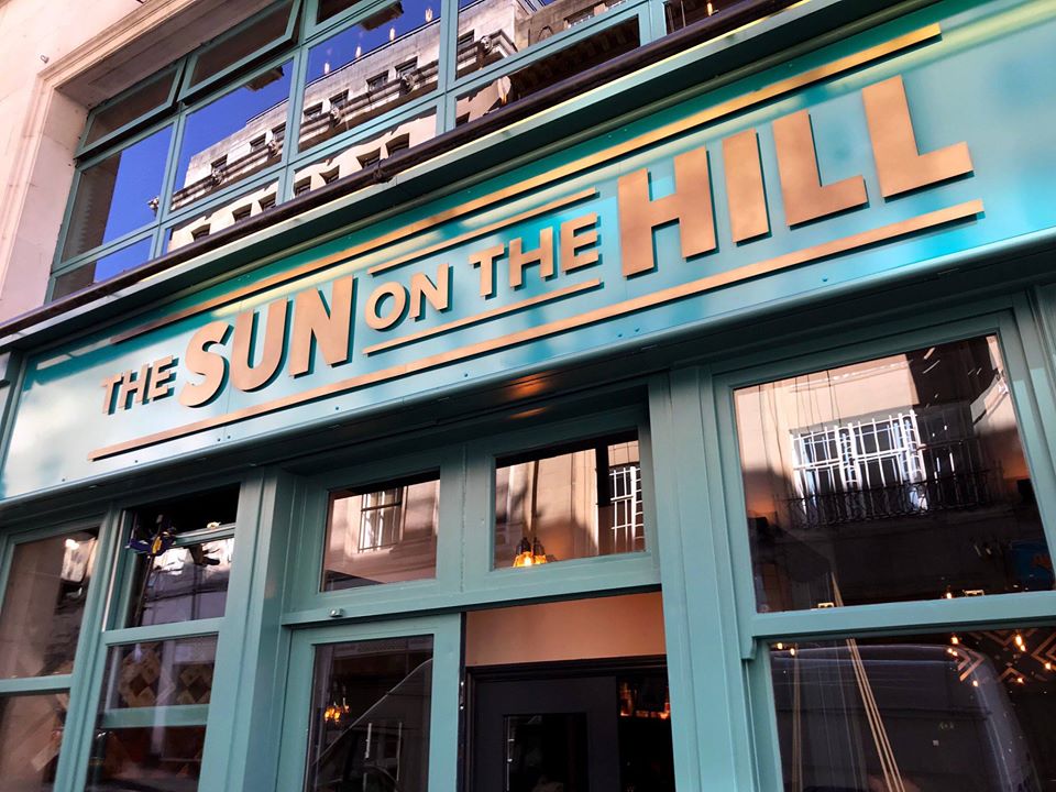 Vibrant bar exterior at The Sun on the Hill, perfect for events and gatherings.