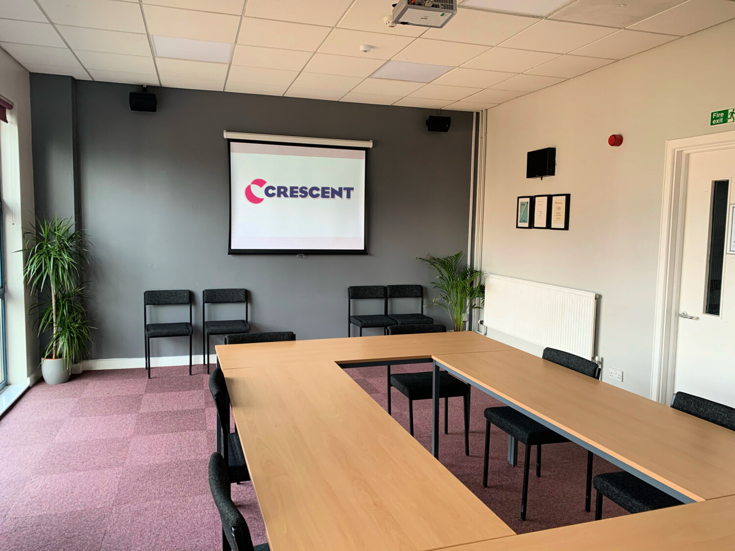 Baskerville Room at Crescent Theatre: bright meeting space with large table, ideal for workshops.