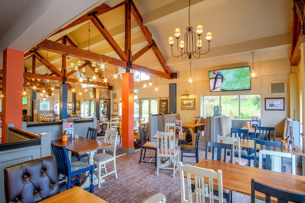 Spacious Lutley Oak restaurant with rustic charm, ideal for events and meetings.