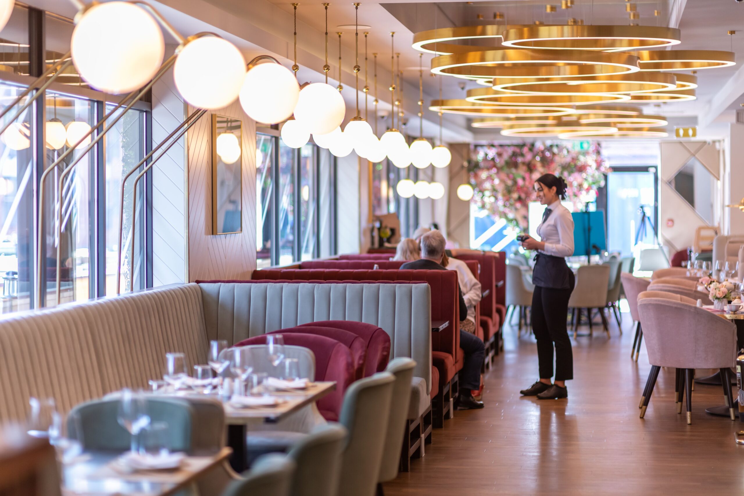 Stylish restaurant interior with elegant lighting, perfect for events and gatherings.