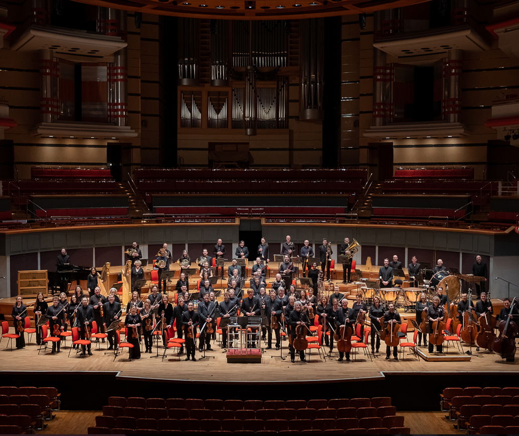 Birmingham Symphony Orchestra stage with full orchestra, ideal for live music events.