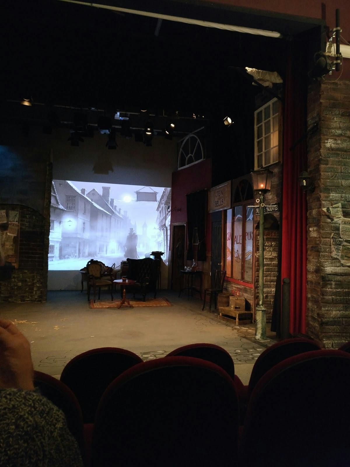 Studio Theatre stage set with vintage decor for immersive events and themed gatherings.