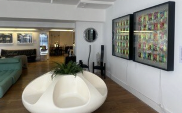 Modern meeting space in The Gallery, featuring unique seating and vibrant artwork.