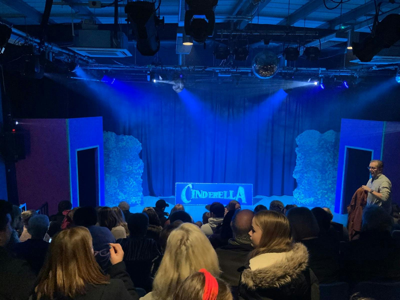 Auditorium at Dovehouse Theatre, cozy seating for "Cinderella" performance event.