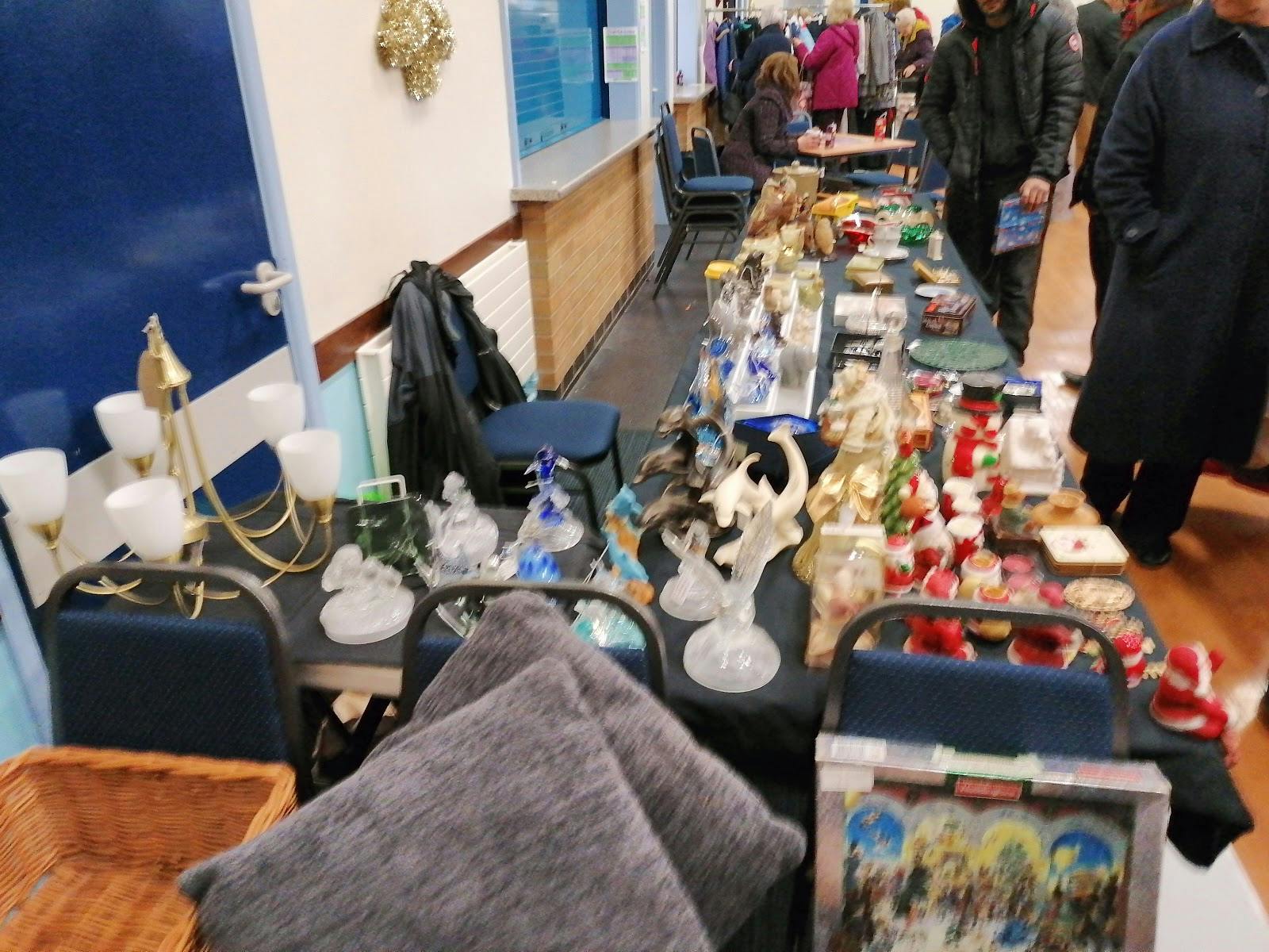 Vendor setup with decorative crafts at Layca Community Centre event.