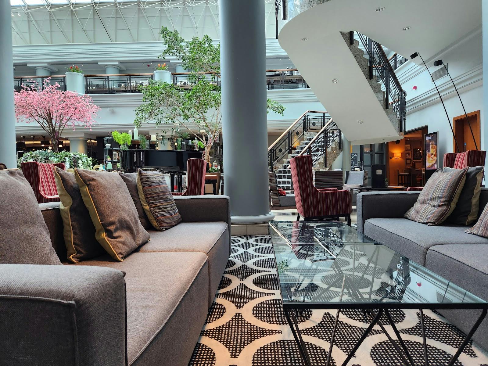 Stylish lounge area in Aria Restaurant, perfect for networking events and meetings.