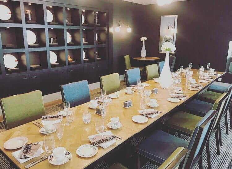 Elegant dining room in Aria Restaurant, perfect for intimate meetings and gatherings.