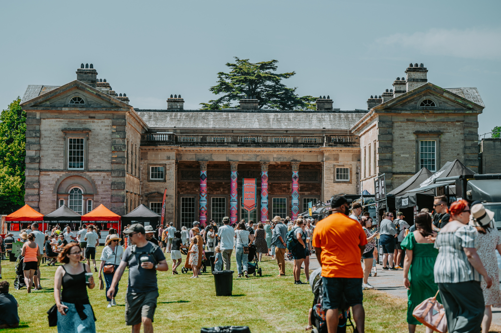 Digbeth Dining Club outdoor festival with vibrant food stalls and lively atmosphere.