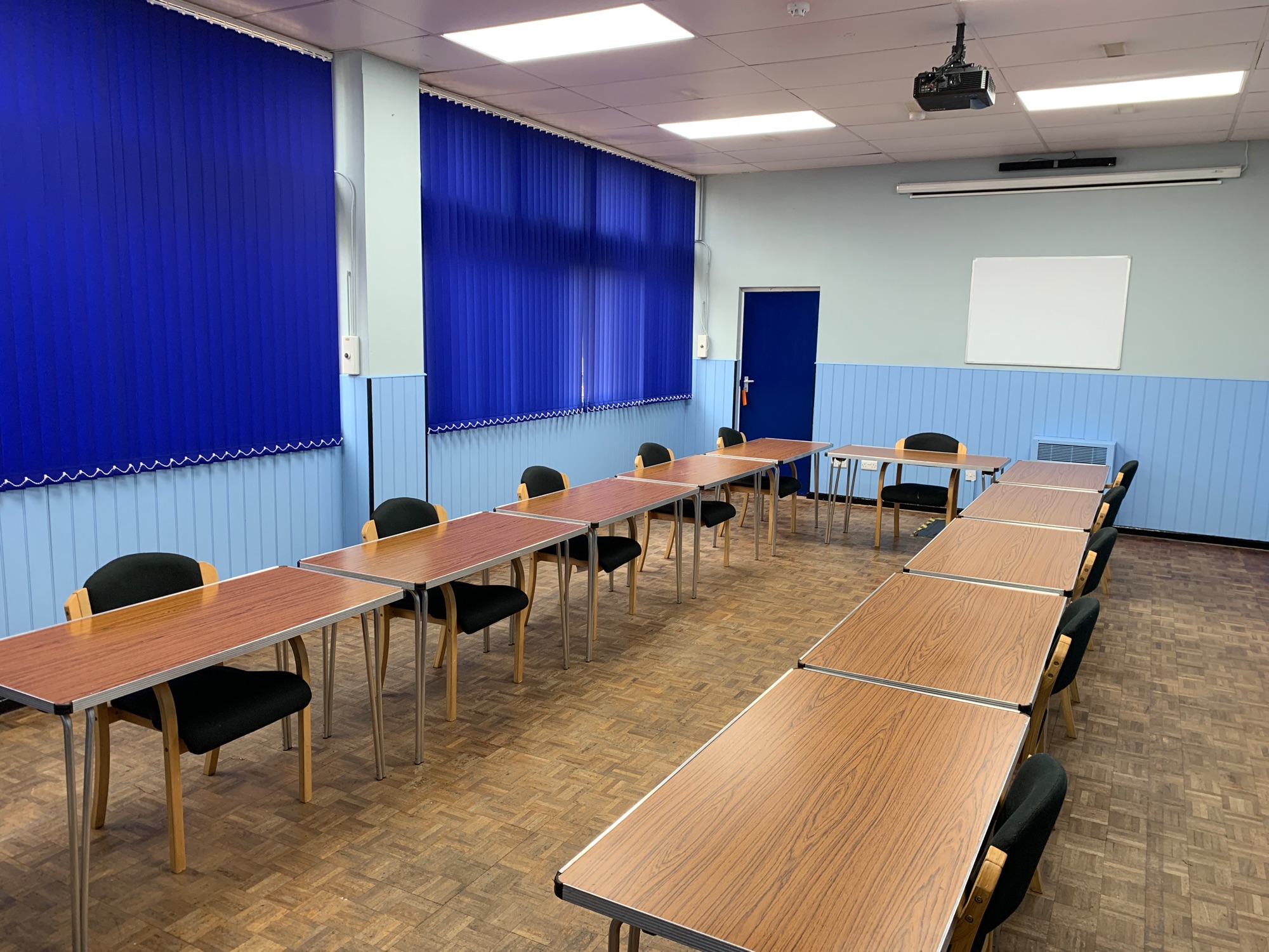 Versatile U-shaped meeting room in Quinborne Community Centre, ideal for workshops.