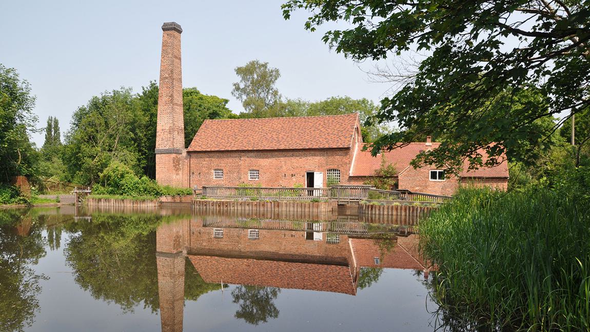 Sarehole Mill, rustic venue by water, ideal for outdoor events and workshops.