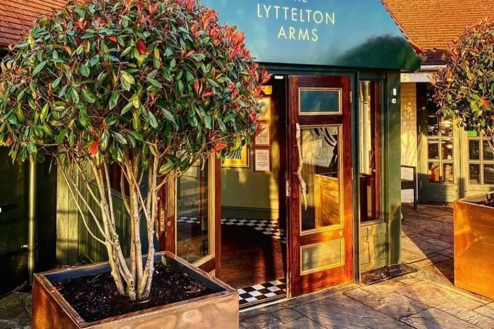 Inviting courtyard entrance at The Lyttelton Arms, ideal for meetings and events.