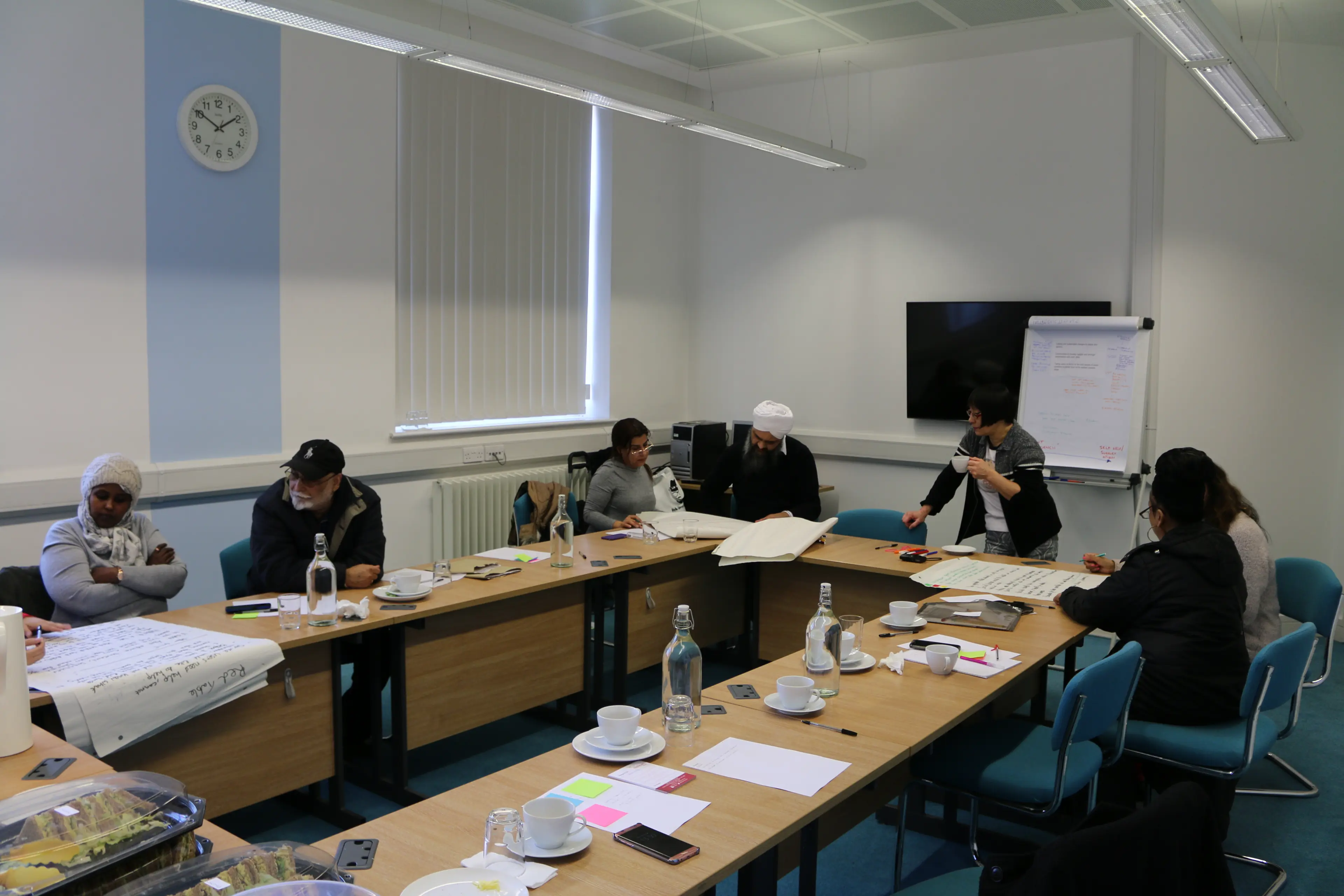 Training room at Nishkam Centre with large table for collaborative meetings and brainstorming.