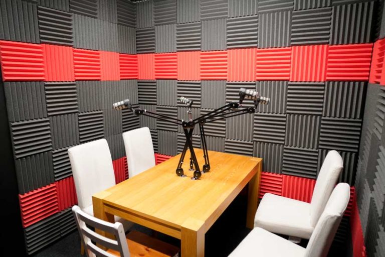 Soundproof meeting room at Base Studios for podcasts and virtual meetings.