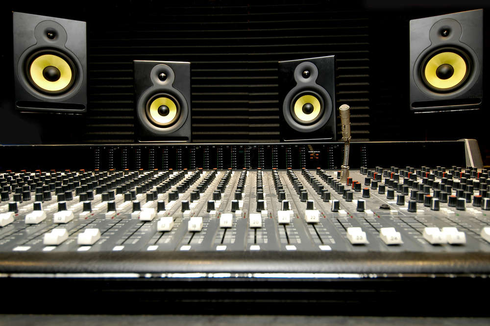 Professional audio mixing console in Base Studios for high-quality sound events.