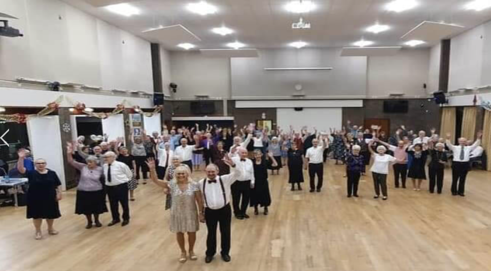 Lively dance event at The Hall, Addison Centre with diverse attendees and vibrant atmosphere.