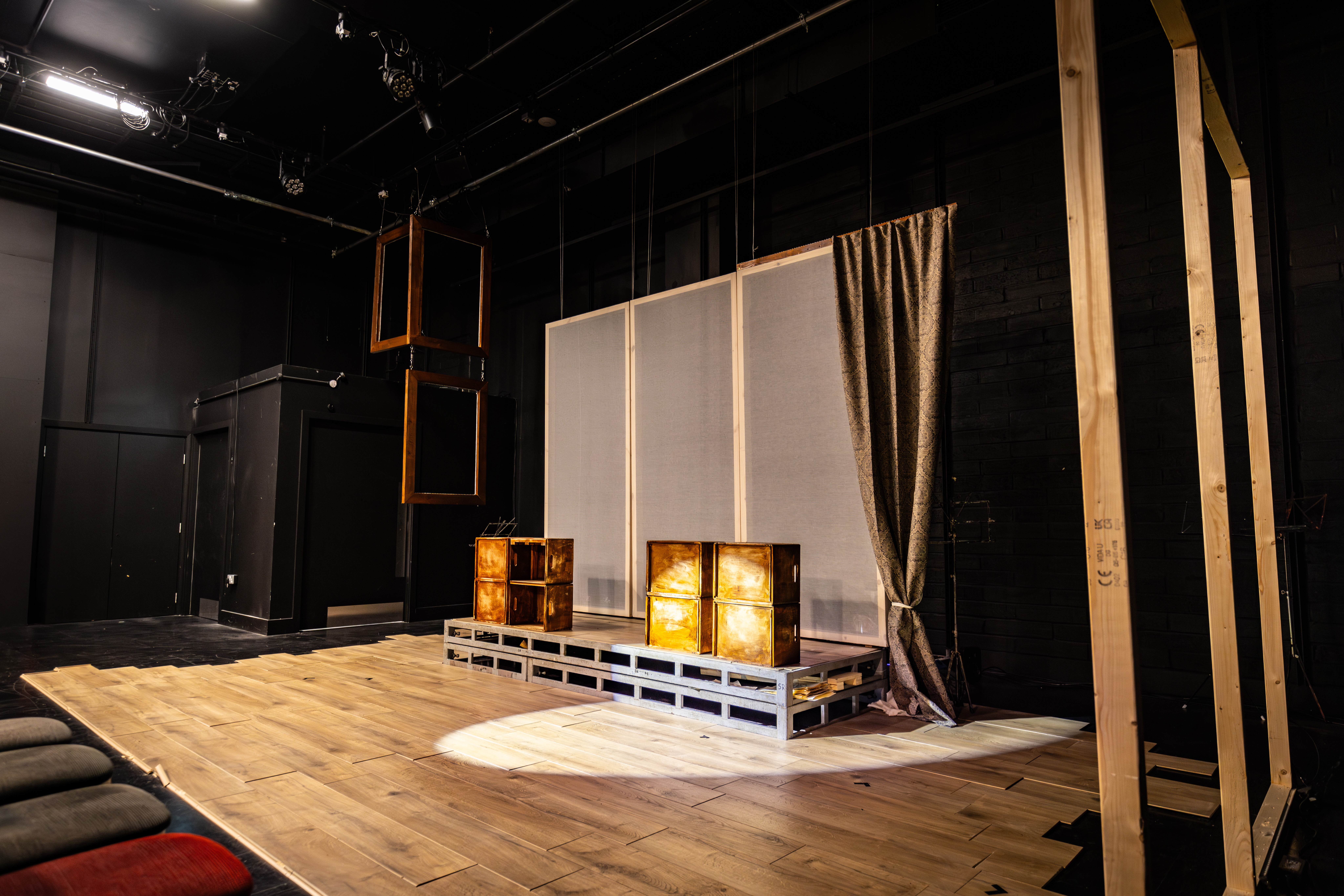 Versatile King's Head Theatre auditorium with minimalist stage for events and performances.