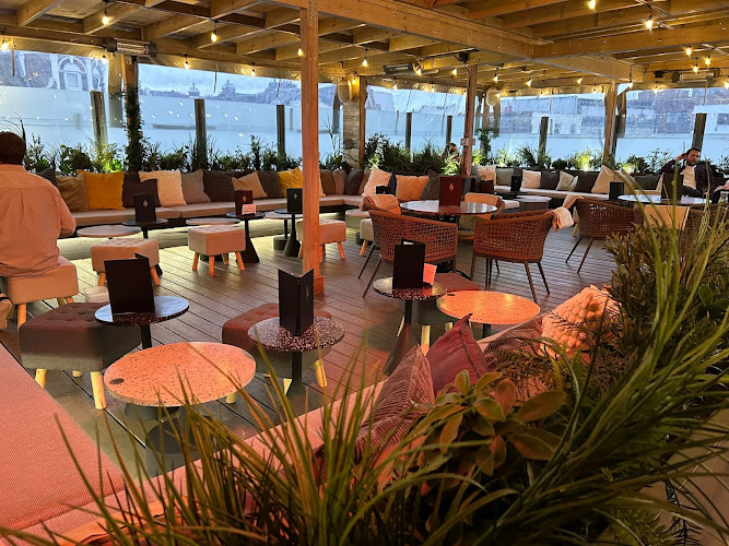 Stylish lounge with comfortable seating for networking events at The Corin.