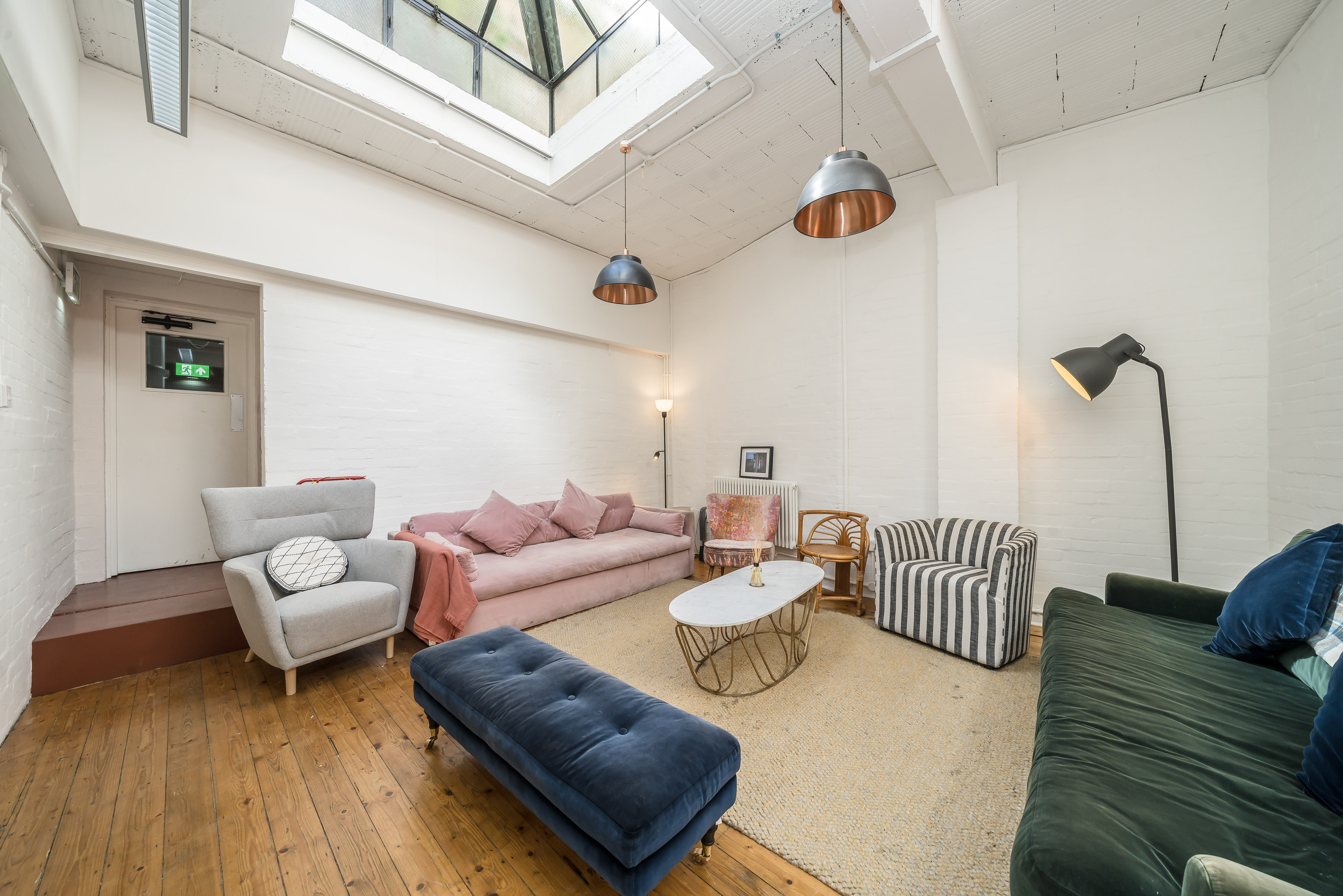 Stylish meeting space at Menier Playhouse with natural light for creative gatherings.