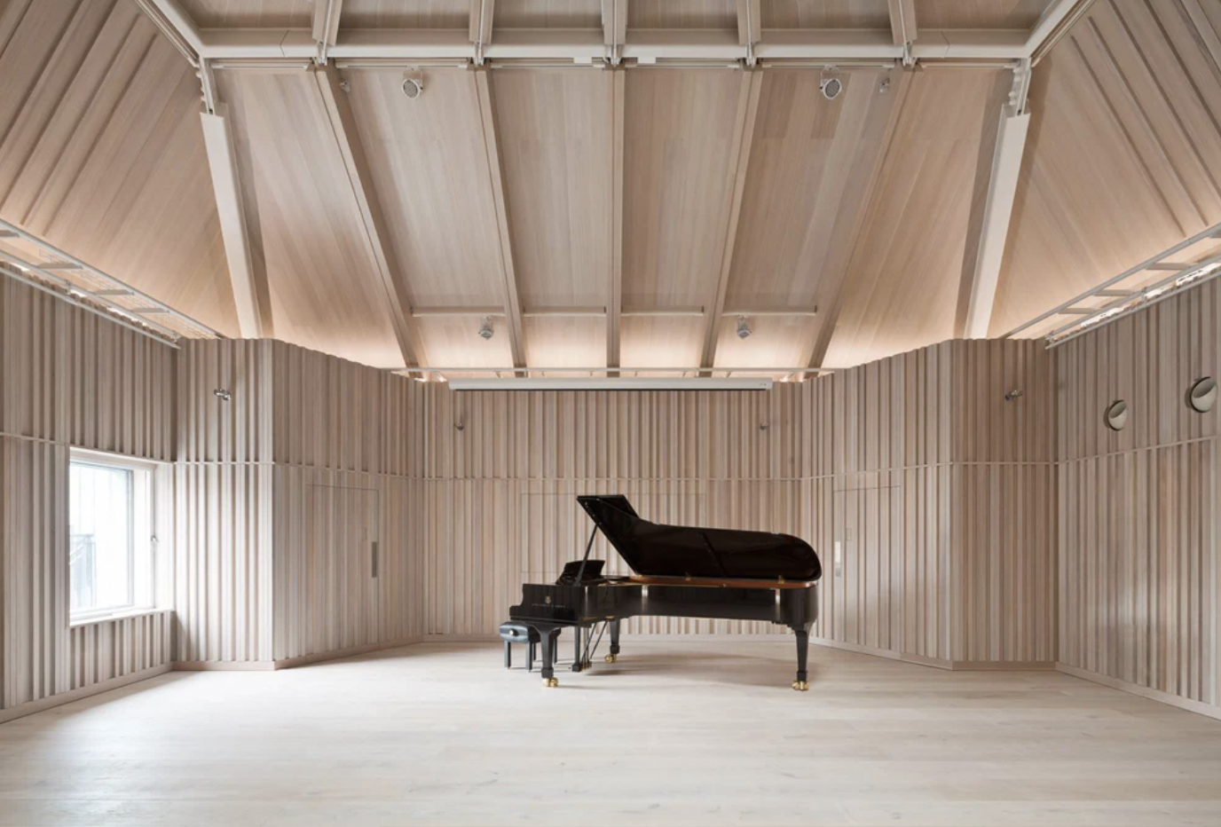 Angela Burgess Recital Hall with grand piano, ideal for concerts and workshops.