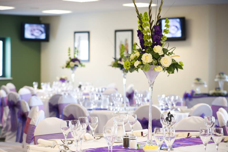 Elegant banquet setting at McCoys Marquee, Ffos Las Racecourse for formal events.