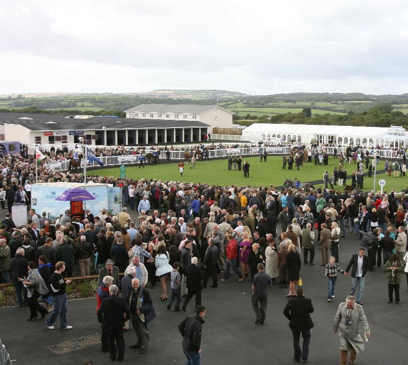 McCoys Marquee at Ffos Las Racecourse, hosting vibrant corporate event with hospitality tents.