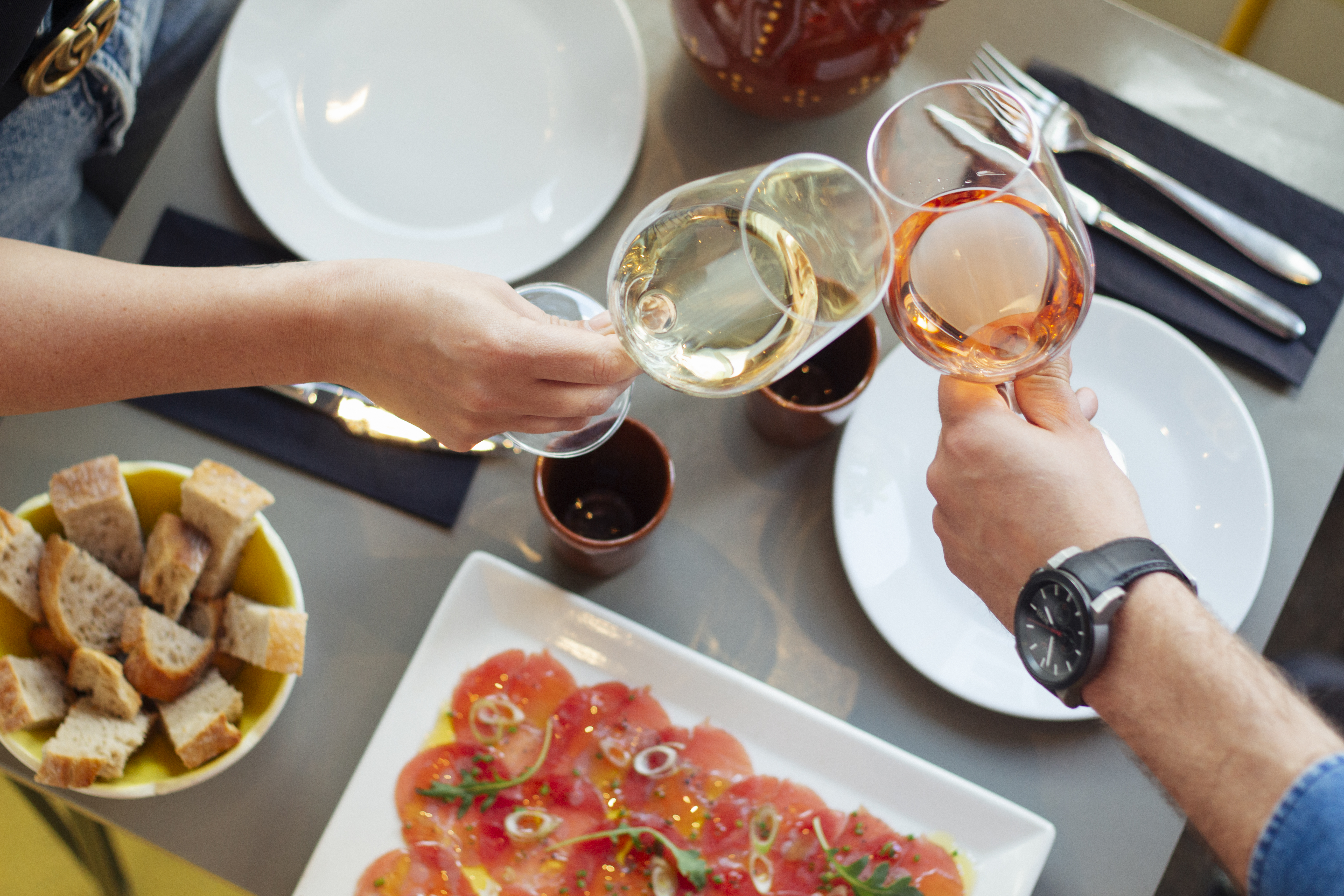 Elegant dining event at Whole Venue in Llerena with gourmet dishes and wine glasses.