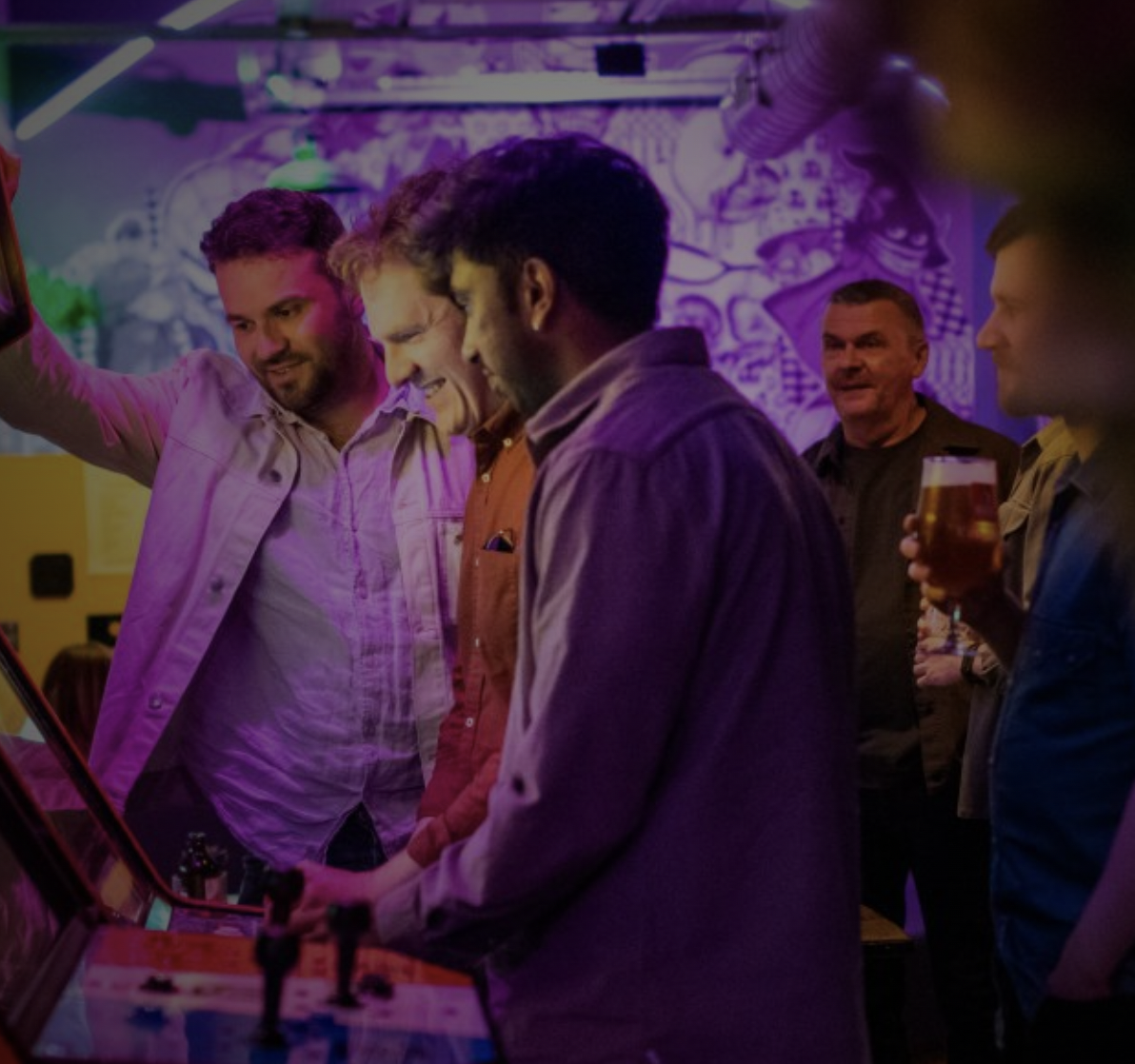 Vibrant networking venue in Four Quarters Newcastle with colorful lighting.