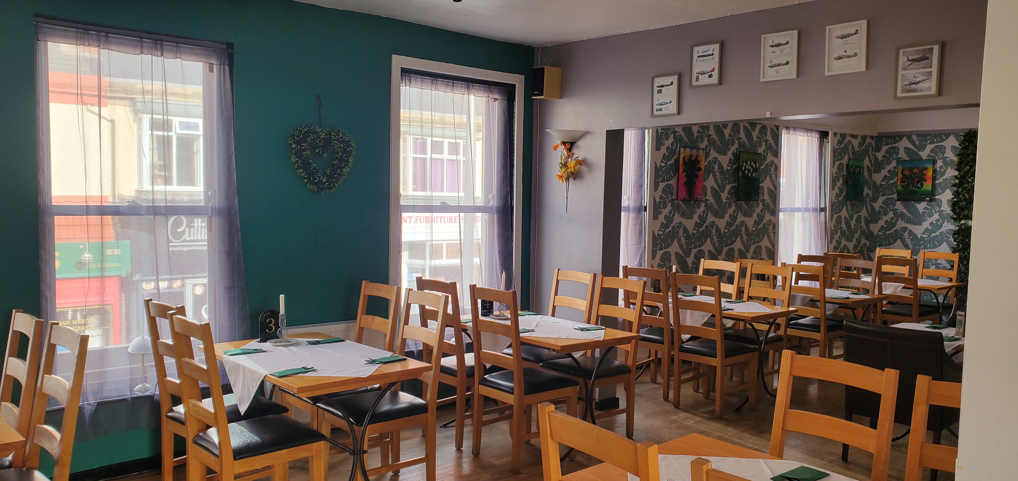 Cozy function room for intimate meetings and small events with vibrant decor.