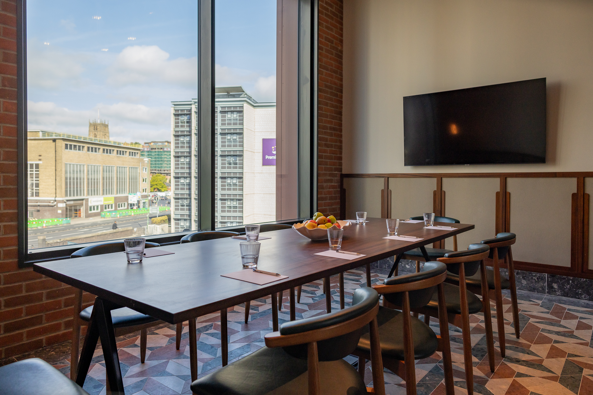 Boardroom at Cleaver & Wake with wooden table, ideal for meetings and events.