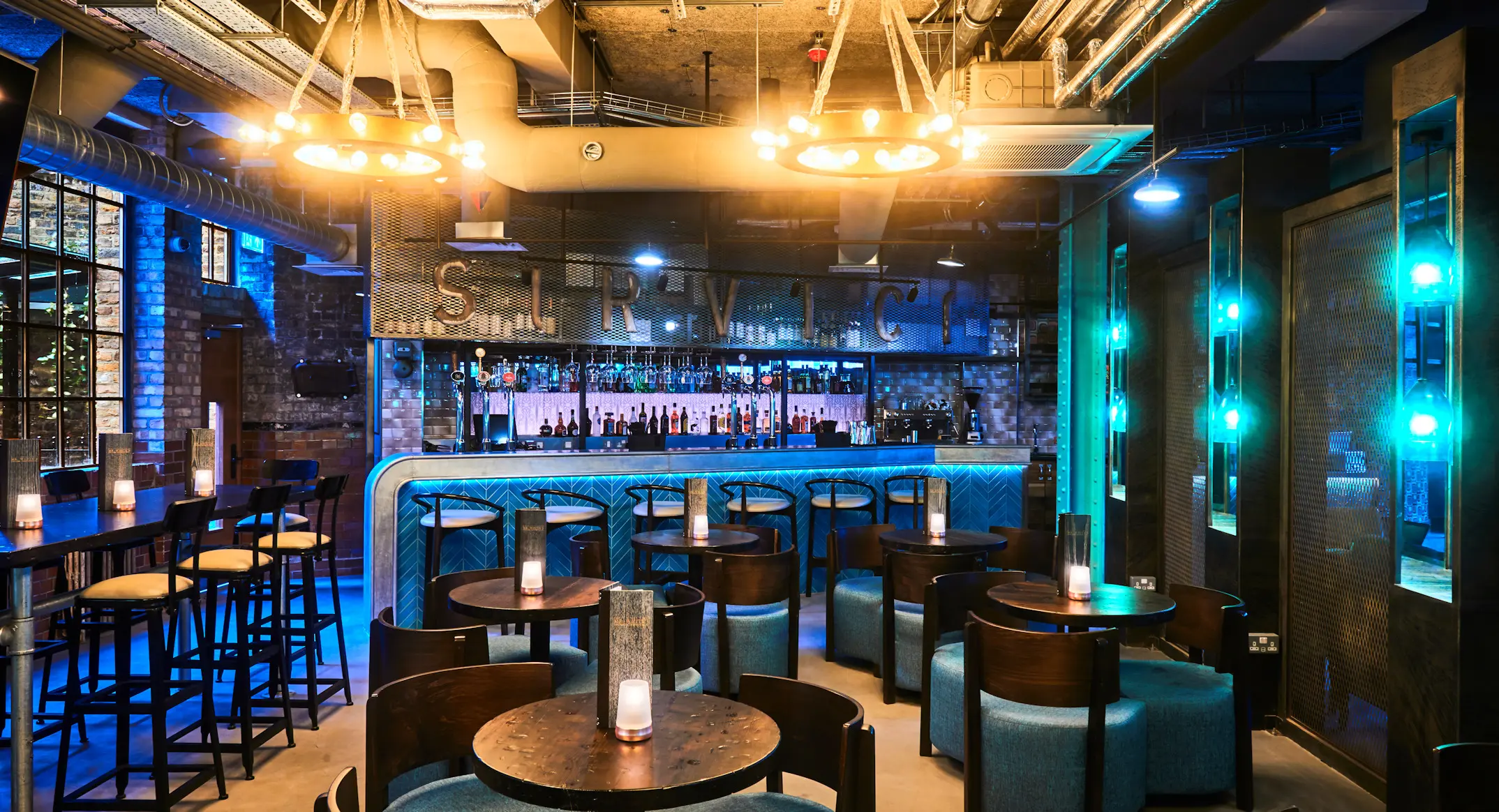 Stylish bar at New Road Hotel, perfect for intimate gatherings and networking events.