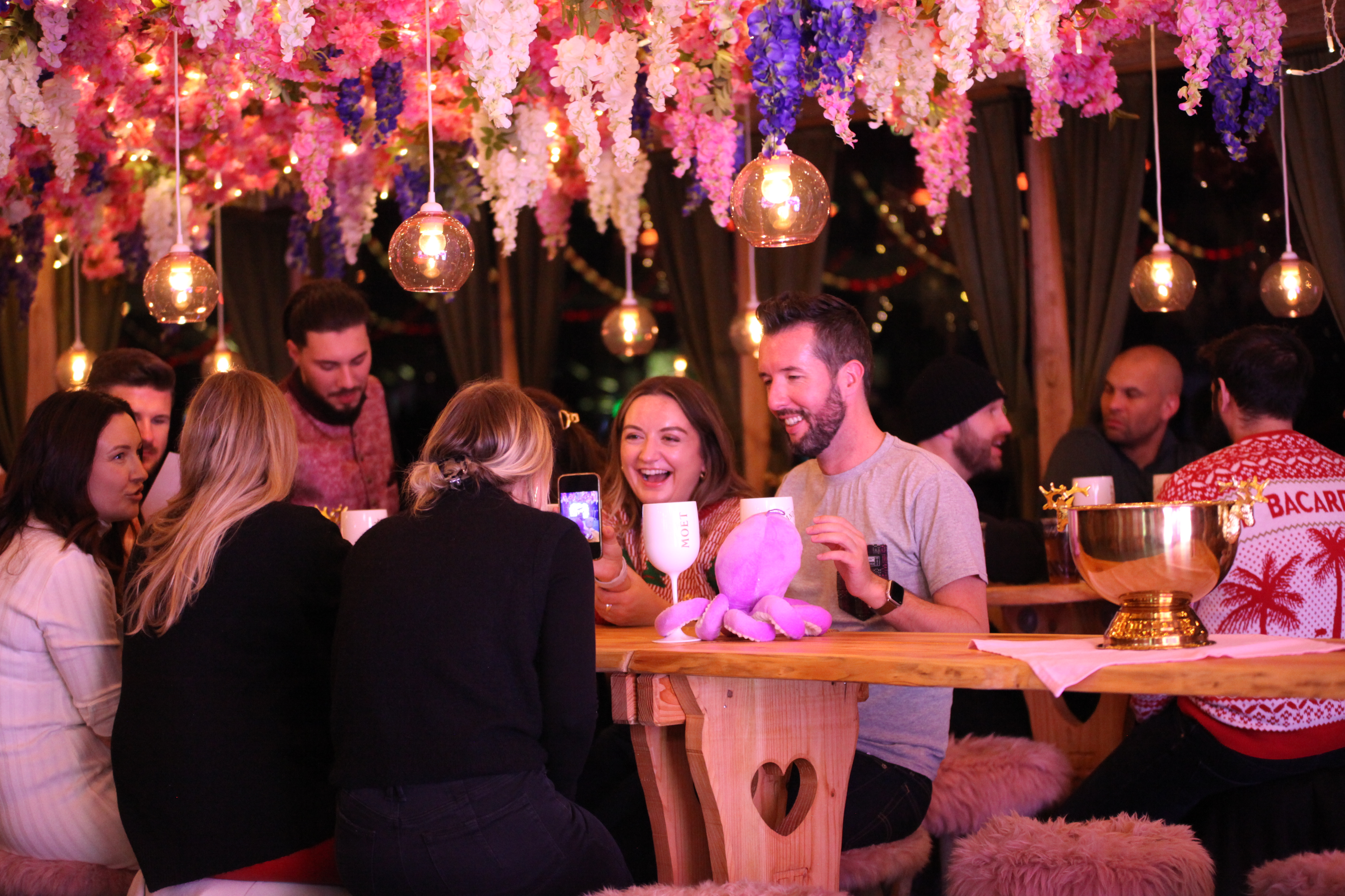 Mary & Me Champagne Bar: vibrant floral decor for networking events in Bavarian Village.