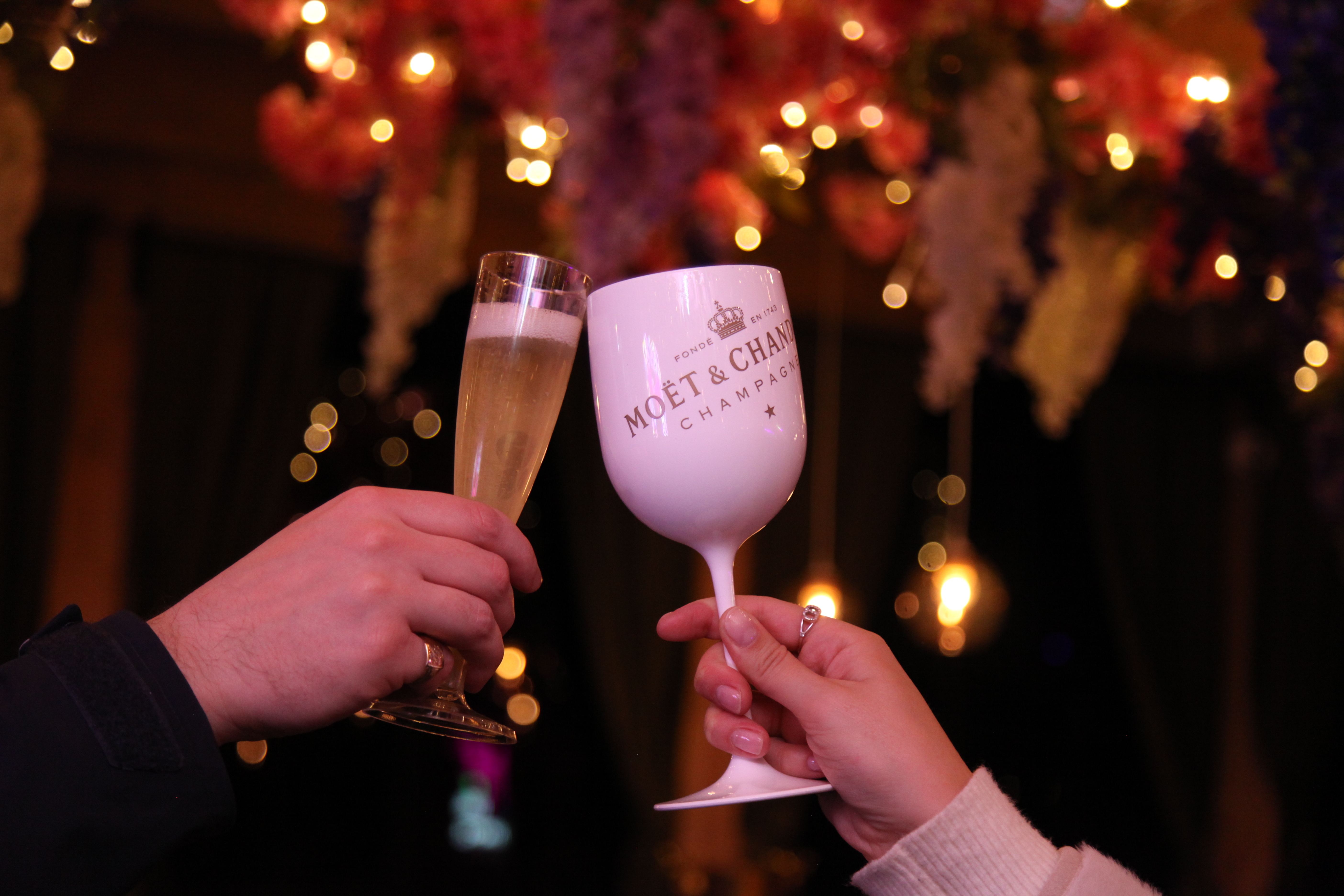 Mary & Me Champagne Bar toast with elegant flutes, perfect for celebrations and networking.