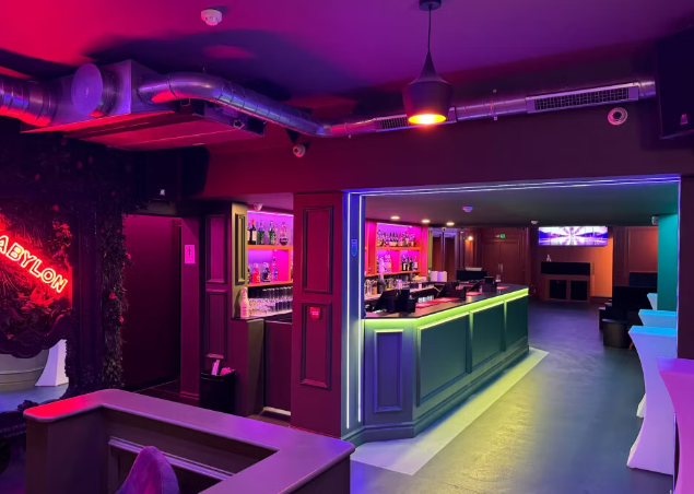 Vibrant cocktail bar at Babylon Lounge, perfect for networking events and social mixers.