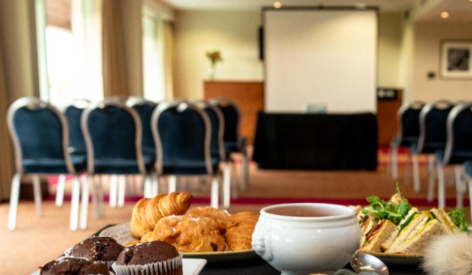 Meeting space at Sedgefield Racecourse with pastries for networking event.
