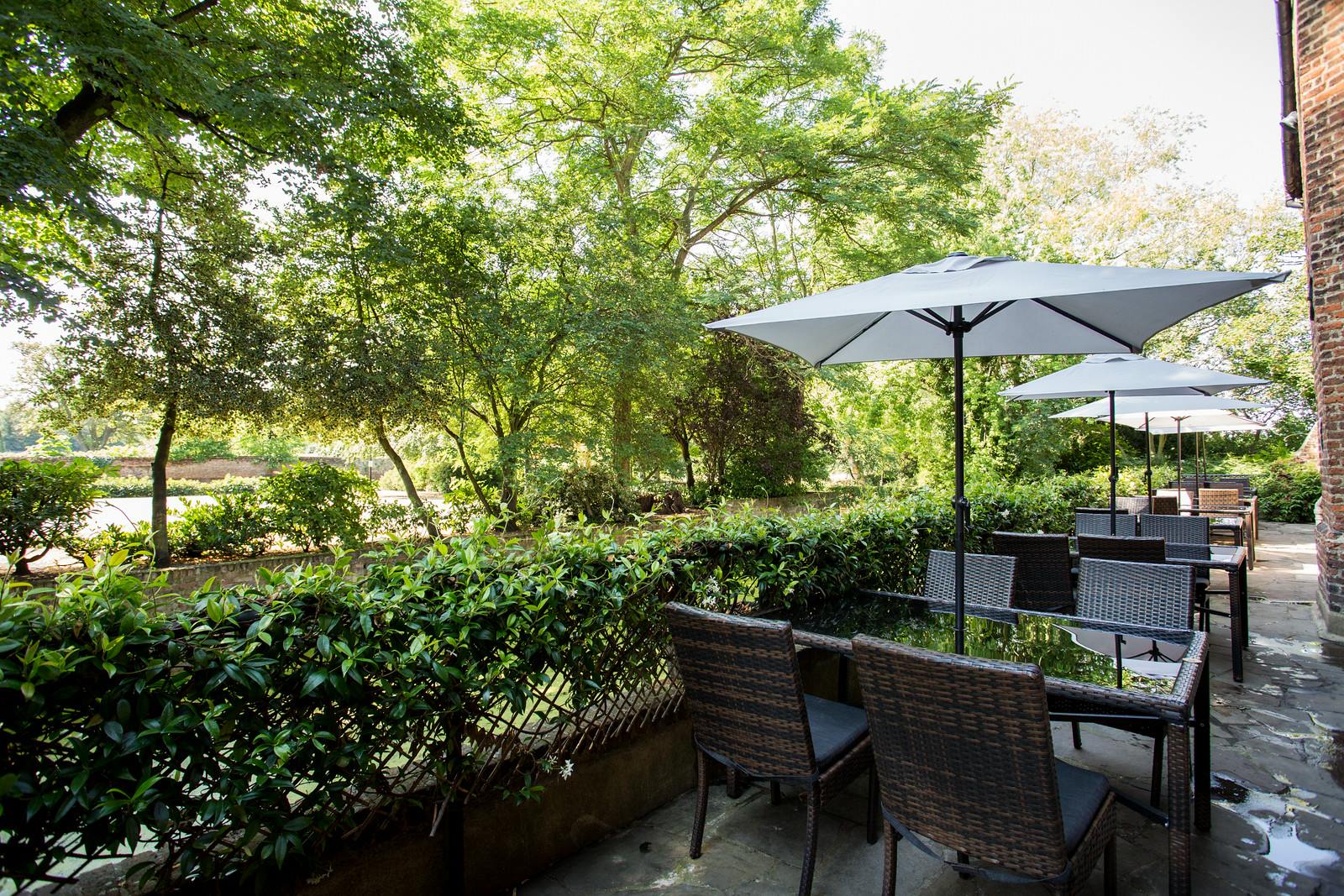 Outdoor seating at Moat Terrace, Tudor Barn Eltham, perfect for networking events.