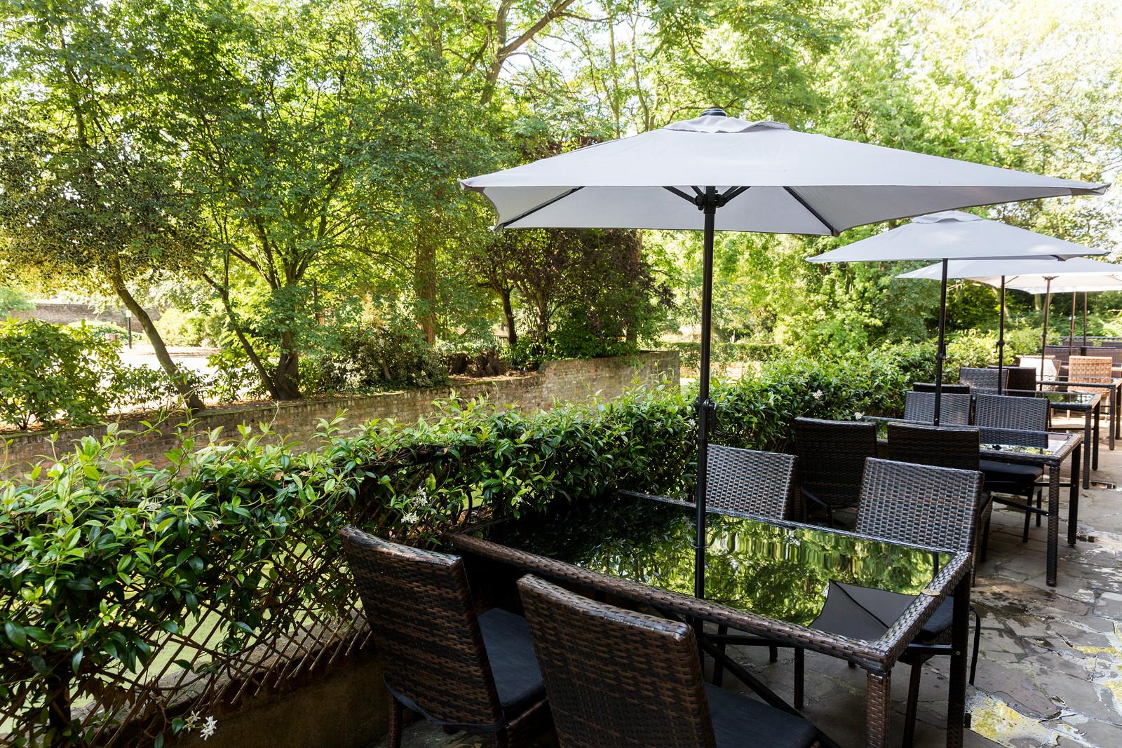 Outdoor seating at Moat Terrace, Tudor Barn Eltham, perfect for summer networking events.