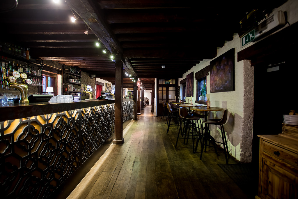 Gastro Pub at Tudor Barn Eltham, cozy venue with wooden beams for events and gatherings.