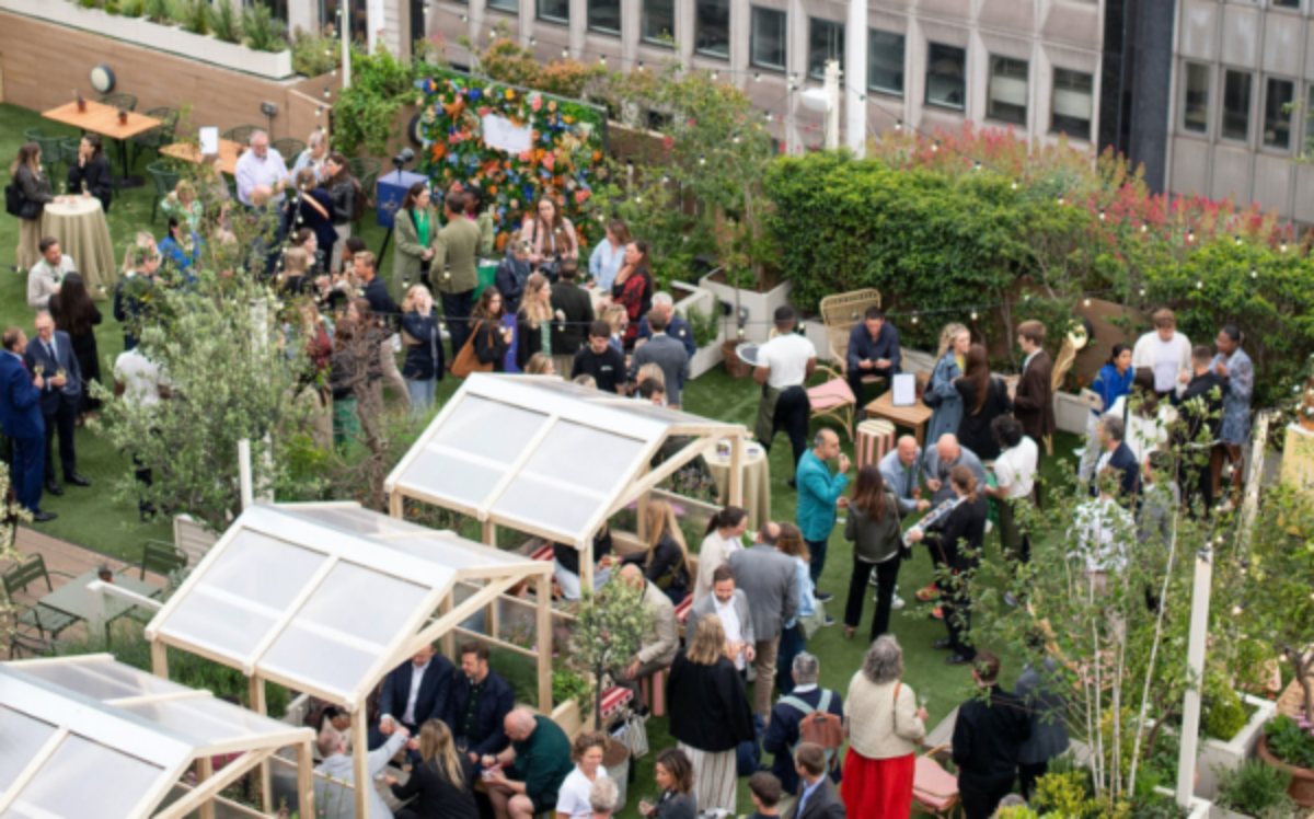 Winter Igloo Experience at 1864 Rooftop Bar, vibrant networking event with cozy seating.