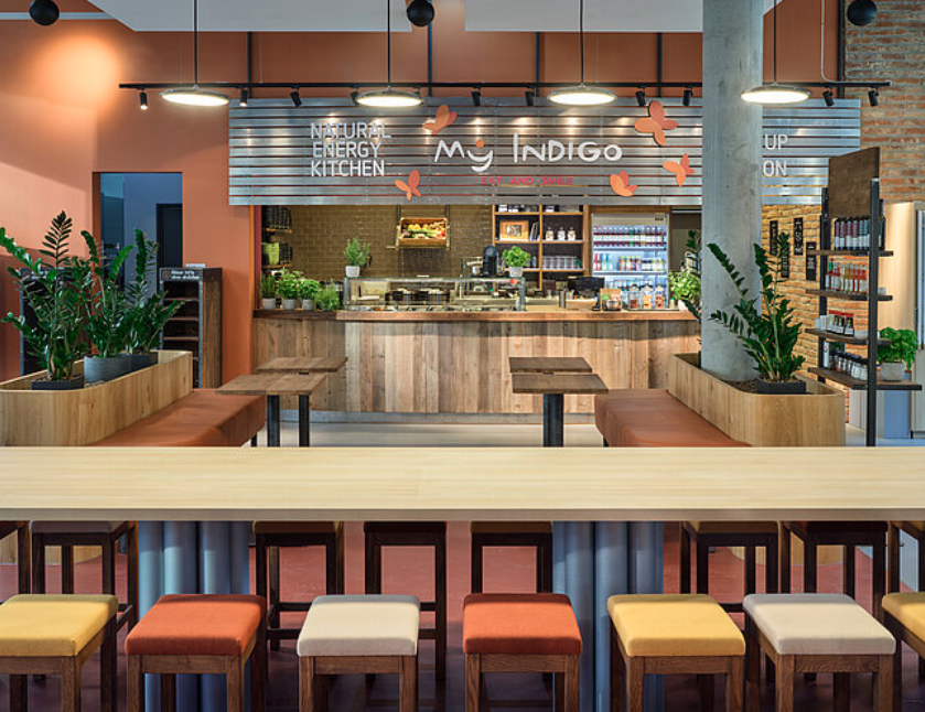 Modern dining space at The Loft, Graduate Cambridge for casual meetings and networking events.