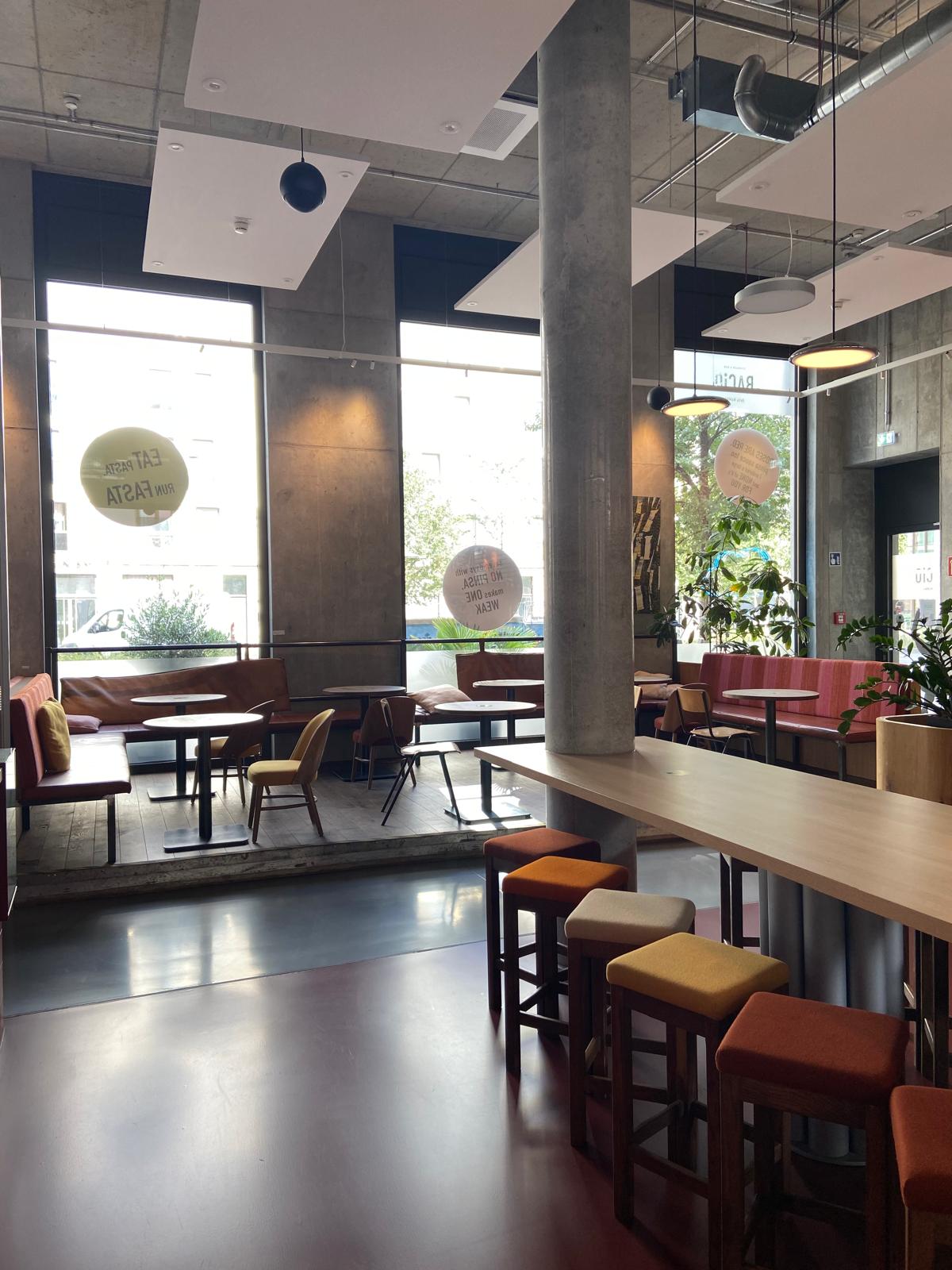 Modern event space at The Loft, Graduate Cambridge with colorful seating for networking.