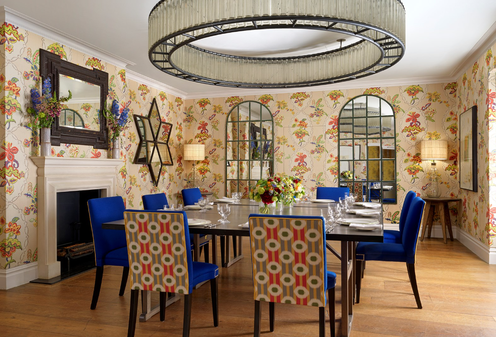 Fortune Room at Covent Garden Hotel: elegant meeting space with floral wallpaper and round table.