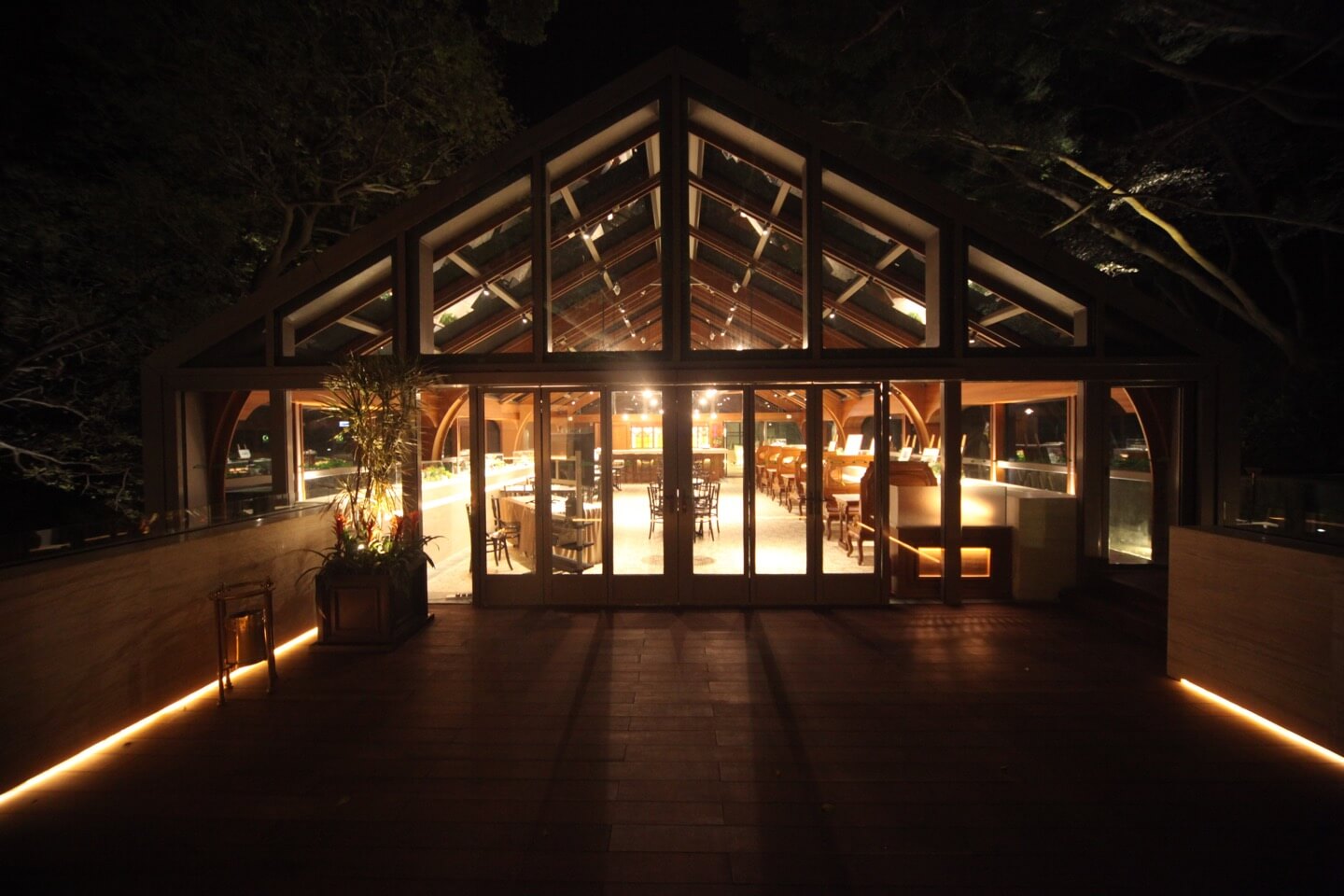 Wedding venue at Tai O Heritage Hotel with modern glass structure and natural wood accents.