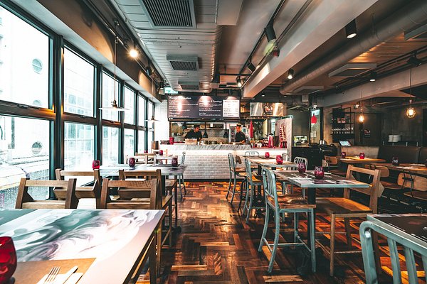 Moon Gate terrace restaurant with stylish decor, perfect for networking events and team lunches.