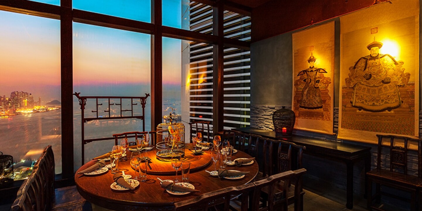 Elegant dining table at Moon Gate terrace, perfect for upscale events with skyline views.
